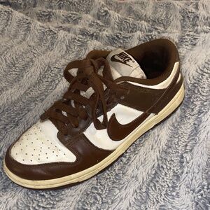 Nike woman’s Chocolate Brown and White Sneakers